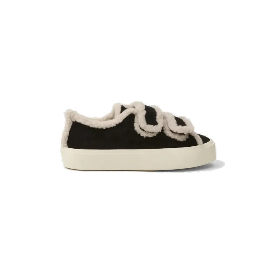 Chaussures noires en shearling à velcro bas