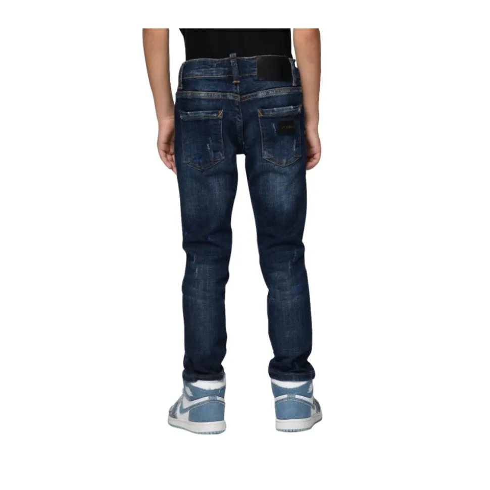 Jean en Denim avec Badge Violet