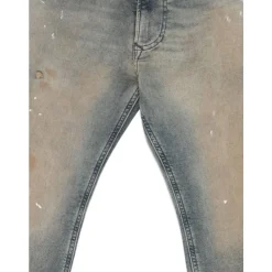 Jeans à effet usé