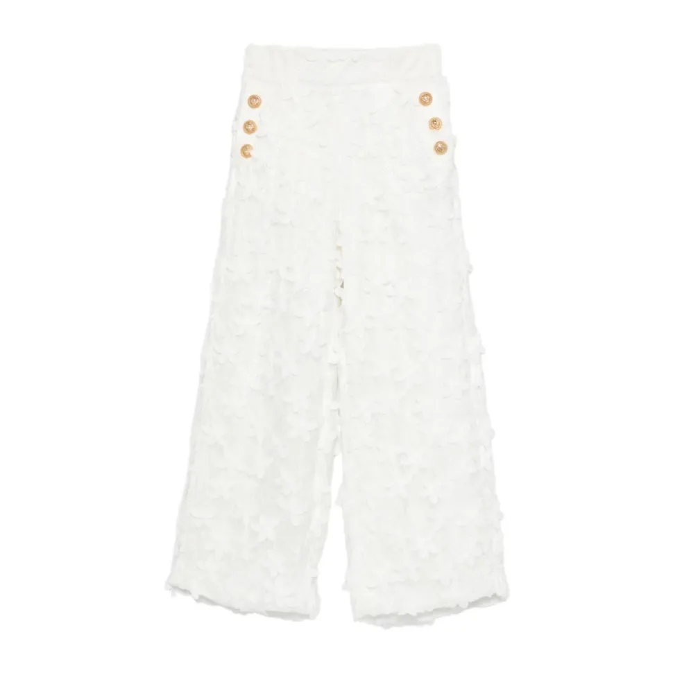 Pantalon en dentelle avec boutons dorés